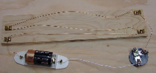 copper wire, light bulb, and battery circuit