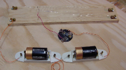 nichrome wire, light bulb, and battery circuit