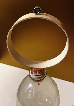 Inertia hoop to bottle drop